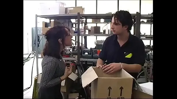 Sexy secretary in a warehouse by workers En iyi Filmleri göster