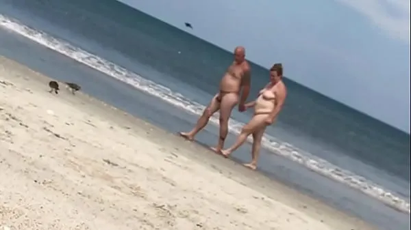 Show ladies at a nude beach enjoying what they see best Movies