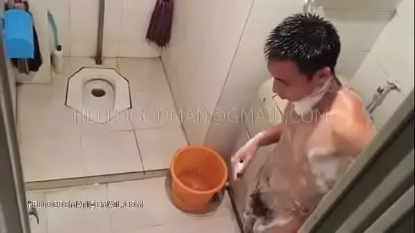 Adult Chinese man taking a shower 최고의 영화 표시